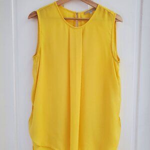 Bright yellow flowy blouse